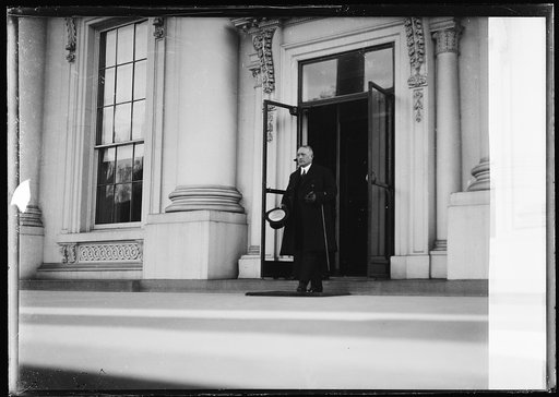 Unidentified man exiting White House. Washington, D.C.