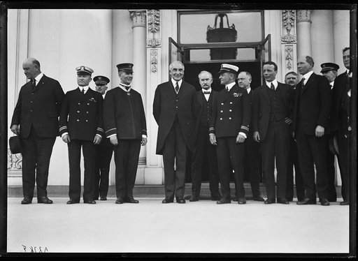 President Harding and group; includes Edwin Denby, left; Albert Fall, to right of Harding; and Theodore Roosevelt, Jr., 5th from right. White House, Washington, D.C.