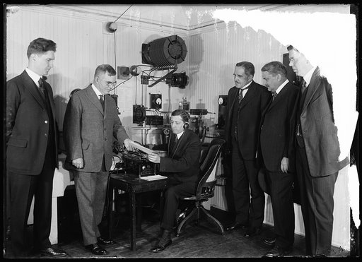Henry C. Wallace, 2nd from left; Will Hays, seated