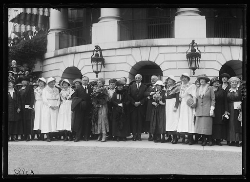 Mr. and Mrs. Harding and group outside White House, Washington, D.C.