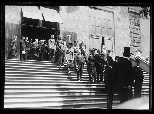 Funeral. James J. Davis exiting church