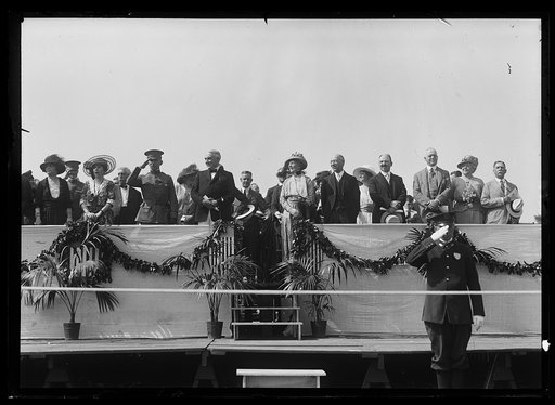 President and Mrs. Harding on stands