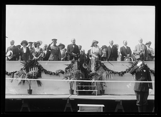 President and Mrs. Harding on stands