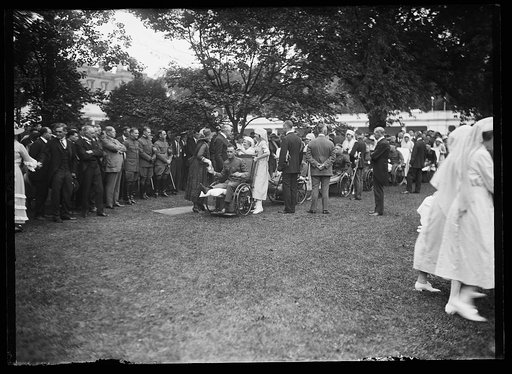 President and Mrs. Harding greet wounded men outside White House, Washington, D.C.