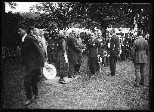 President and Mrs. Harding greet wounded men outside White House, Washington, D.C.
