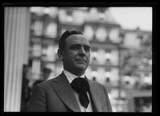 Man at White House; State, War and Navy Building in background. Washington, D.C.