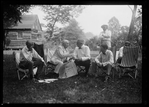 Henry Ford, Thomas Edison,Warren Harding and Harvey Firestone. Firestone camp