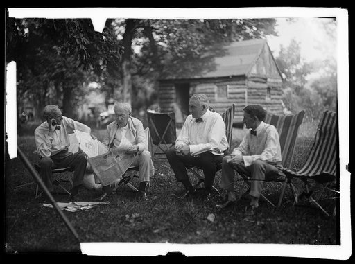 Henry Ford, Thomas Edison, Warren Harding and Harvey Firestone near cabin, Firestone camp