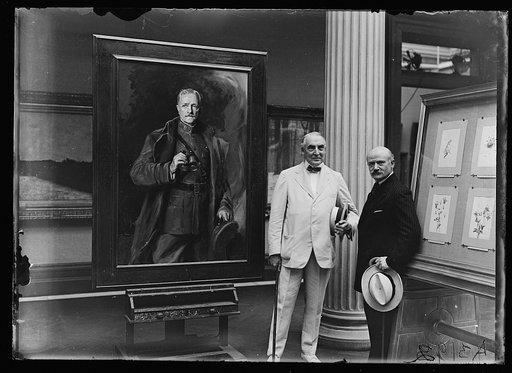 President Harding and unidentified with portrait of John J. Pershing