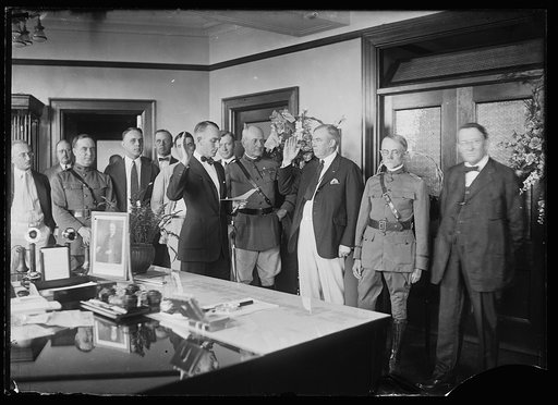 Group at swearing-in; includes John E. Sawyer, 2nd from right
