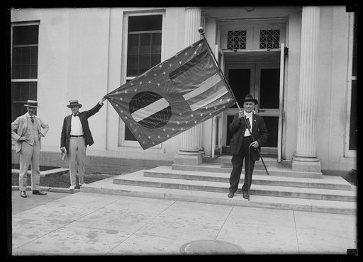 Men with flag. White House, Washington, D.C.