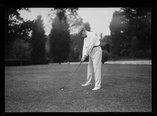 Charles Evans Hughes playing golf