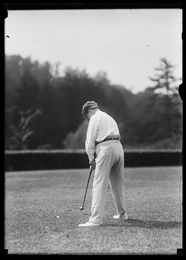 Charles Evans Hughes playing golf