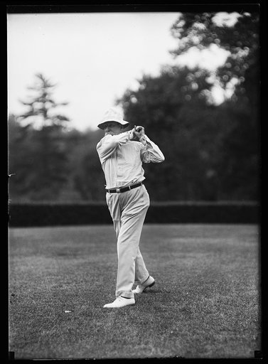 Charles Evans Hughes playing golf