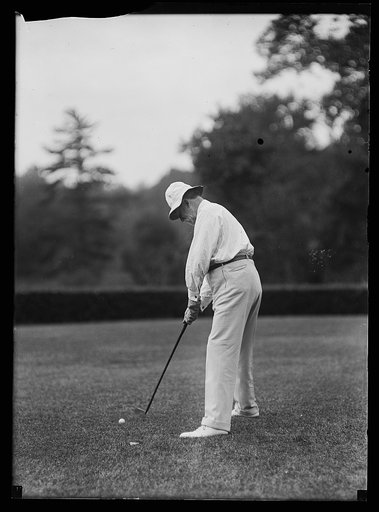 Charles Evans Hughes playing golf