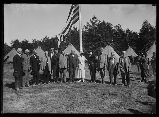 Mr. and Mrs. Harding with Civil War veterans during the Marine maneuvers at Wilderness Battlefield, Virginia, Oct. 1921
