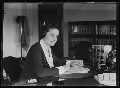 Mrs. Mabel W. Willebrandt at desk
