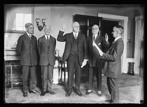 F.E. Scobey being sworn in as director of the Mint