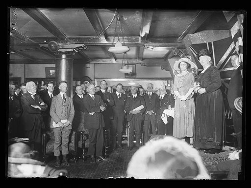 Alice Mary Robertson on stage, right