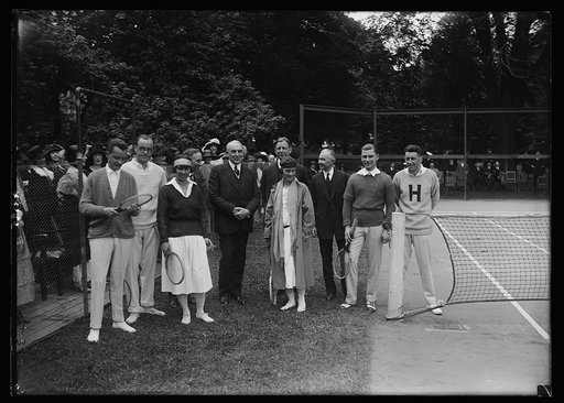 Line up of celebrities at the exhibition tennis matches at the White House. Mrs. Molla Bjurstedt Mallroy (at left of Pres.), Mrs. Marion Zinder- Stein Jessup (at right) also Watson M. Washburn and Ace F. Johnson