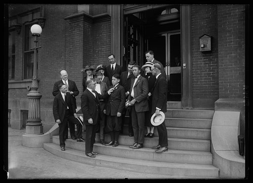 Secy. of Agric. Wallace conferring Dept. medal on Joseph E. Glacking, one of the 3 Maryland boys who won these medals for prize stock and farm product raising