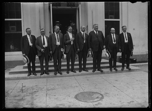 Heads of the various divisions of the striking shopmen who held a long conference with Pres. Harding looking toward a settlement. L. to r.: J.A. Franklin, boilermakers, J.M. Burns, sheet metal workers, Tim Healey (hiremen, oilers), B.M. Jewell, chairmen, James Kline (blacksmiths), Martin F. Ryan (ca