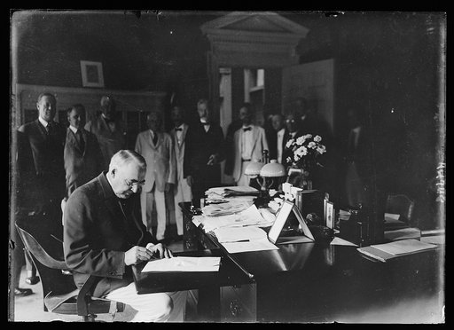 Pres. Harding signing Mileage Script Bill