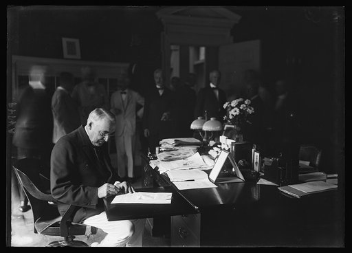 Pres. Harding signing Mileage Script Bill