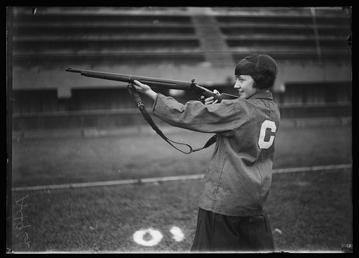 Young woman with rifle
