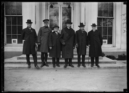 War veterans ask Pres. Harding to issue a proclamation requiring the Amer. Flag without gold braid and trimmings to be flown on Flag Day [White House, Washington, D.C.
