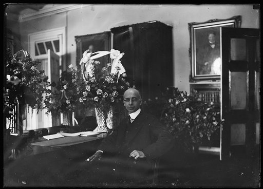 Henry M. Dawes at desk. Comptroller of Currency