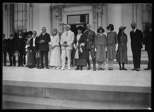President and Mrs. Harding and group outside White House, Washington, D.C.