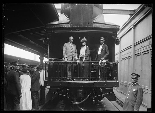 President and Mrs. Harding on back of train