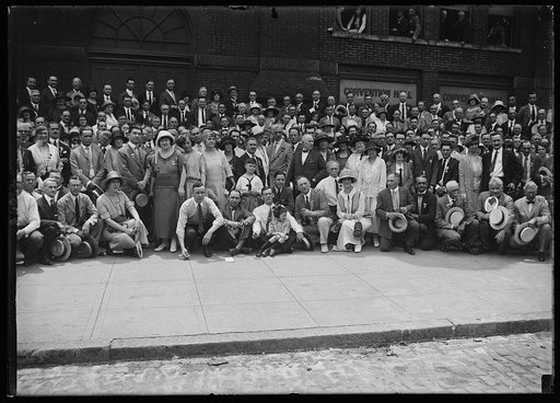 Members of Photographers Assoc. of America with families at Convention Hall