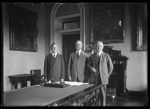 Charles Evans Hughes, center