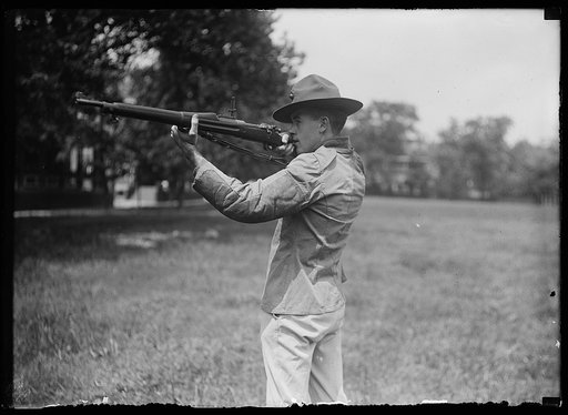 Young man with rifle