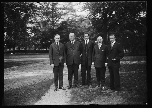 Calvin Coolidge, Edwin Denby, Patrick J. Hurley?, unidentified, and Theodore Roosevelt, Jr.?