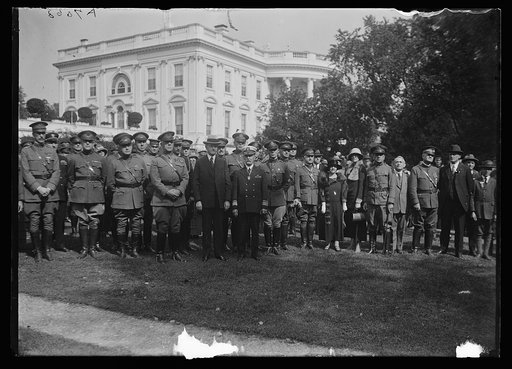 Calvin Coolidge and military group outside White House, Washington, D.C.