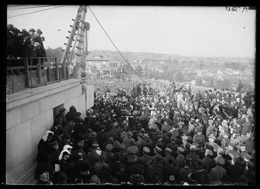 Laying cornerstone of Geo. Washington Memorial at Alex. Va. Pres. Coolidge is at the edge of the stone with trowel used by Geo. Washington when he laid cornerstone at the Capitol