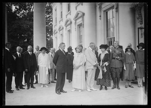 Florence and Warren Harding with group outside White House, Washington, D.C.
