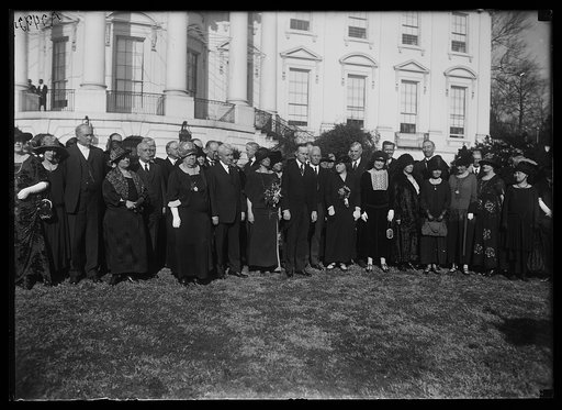 Pres. and Mrs. Coolidge entertain members of Rep. Nat'l Comm. at luncheon at White House, Dec. 12. Posed on south lawn