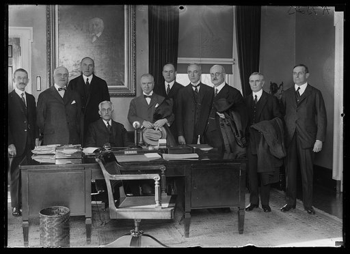 Group; Andrew W. Mellon at desk