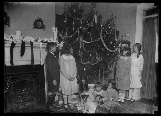 Family group with Christmas tree