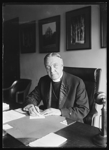 Clergyman with telephone