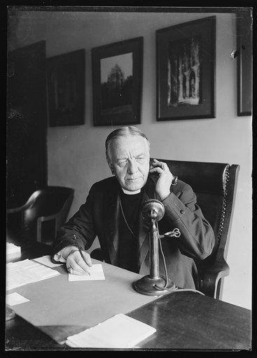 Clergyman with telephone