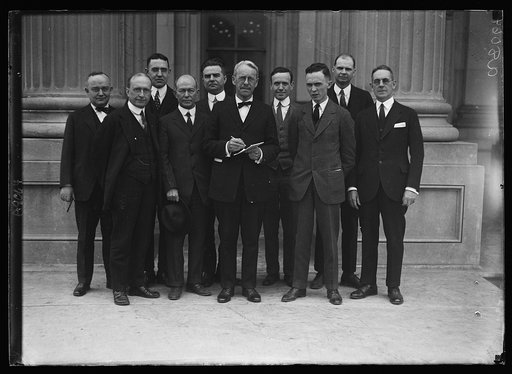 The newspaper correspondents who covered the Tax Revision Bill in the House. Photographed with Chmn. William R. Green of Iowa of the Ways and Means Comm. It was through Chmn. Green and these men that the country was kept posted on the daily progress of this vital legislation. First row, left to righ