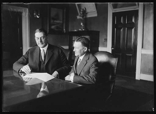 Curtis D. Wilbur, left