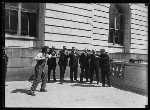 Sen. taking lessons in physical culture. L. to r.: Bernarr MacFadden, famous physical culture expert of N.Y., Sen Arthur Copper, Sen. C.C. Dill, Rep. Macfadden, Sen. Magnus Johnson, Rep. John M. Nelson and Sen. Brockhart