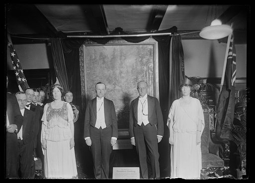 A large painting showing the late Pres. Harding addressing a crowd of 40000 people at Vancouver B.C., was presented to Nat'l Pres Club by the Vancouver Sun, May 8. Painting is entitled "President Harding in Canada." Lft. to rt. in the group: Miss America (Miss Marguerite Meakin), Pres. Coolidge, Sir
