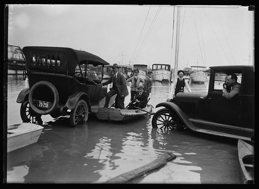 Members of the Cornithian Yacht Club were forced to use rowboats to reach their automobiles due to the rapid rise of the Potomac at Washington